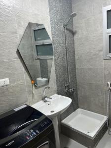Koupelna v ubytování Two bedroom apartment in madinaty