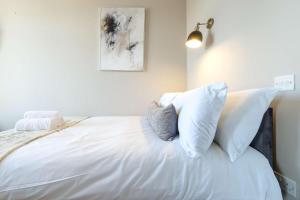 En eller flere senge i et værelse på The Willow studio 3