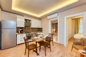 Kuchyň nebo kuchyňský kout v ubytování Port Apart Hotel