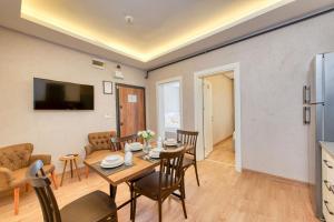 TV a/nebo společenská místnost v ubytování Port Apart Hotel