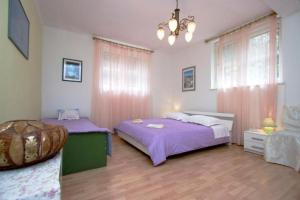 Posteľ alebo postele v izbe v ubytovaní Apartment Brane