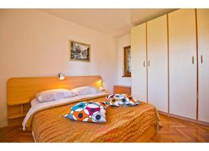 Postel nebo postele na pokoji v ubytování Apartment Mana