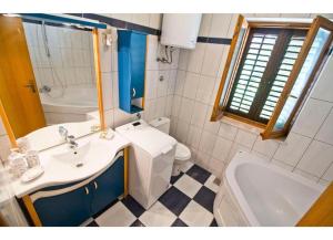 Koupelna v ubytování Apartment Mana