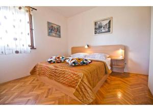 Postel nebo postele na pokoji v ubytování Apartment Mana