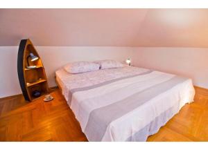 Postel nebo postele na pokoji v ubytování Apartment Mana