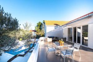 En balkon eller terrasse på House Lili