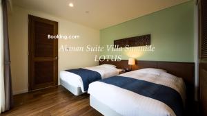 Voodi või voodid majutusasutuse Ahman Suite Villa Sumuide toas