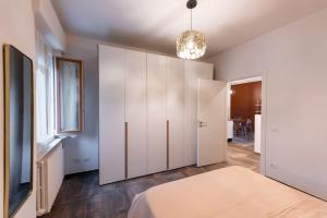 Postel nebo postele na pokoji v ubytování Appartamento San Rocco a Tortona
