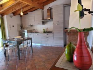 A kitchen or kitchenette at Il nido in montagna Mountain Lake Iseo Hospitality
