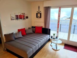 A bed or beds in a room at Apartment Panoramablick