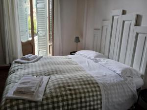 Postel nebo postele na pokoji v ubytování Le 5 Vie