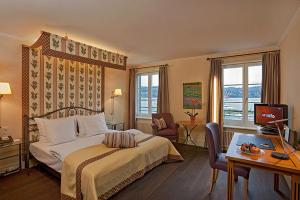 Postel nebo postele na pokoji v ubytování Romantik Seehotel Sonne + 37 fotografií