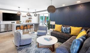 a living room with a couch and a table at Redondo Beach 1BR w Pool Gym nr Beach LAX-396 in Redondo Beach