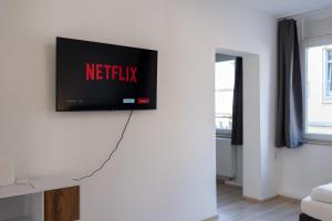 TV a/nebo společenská místnost v ubytování Business Apartment 1 Essen