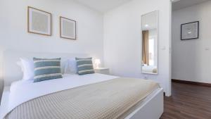 Giường trong phòng chung tại Casa da Roseira by LovelyStay +53 ảnh