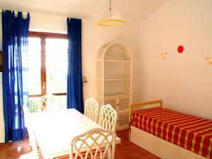 Postel nebo postele na pokoji v ubytování Residence La Giungla