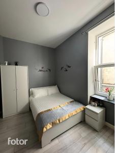 Uma cama ou camas num quarto em Leitrim Property Cork