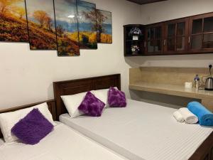 Postel nebo postele na pokoji v ubytování Dinu Lanka Resort