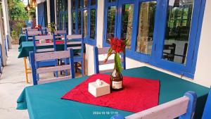 A restaurant or other place to eat at Hotel Butterfly - Peaceful Garden for Nature Lovers