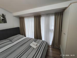 Postel nebo postele na pokoji v ubytování Kuća za odmor Tina