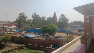 a view of a city from a building at Banke Bihari Spiritual Stay in Vrindāvan