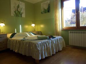 מיטה או מיטות בחדר ב-Homestay Srebrny Potok