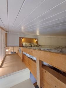 Ένα ή περισσότερα κρεβάτια σε δωμάτιο στο Très beau Studio au Centre de Tignes Val Claret