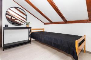 Postel nebo postele na pokoji v ubytování House Mario