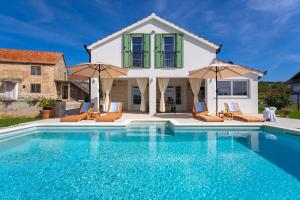 Πισίνα στο ή κοντά στο 2-bedroom Villa Providenca