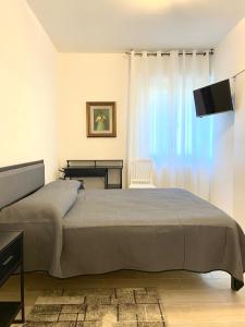 Postel nebo postele na pokoji v ubytování A-B House