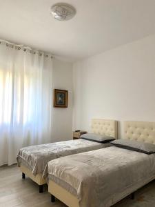 Postel nebo postele na pokoji v ubytování A-B House + 30 fotografií
