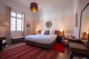 Postel nebo postele na pokoji v ubytování Appartements Balima Harcourt DeLuxe
