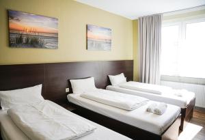 Postel nebo postele na pokoji v ubytování Hotel City Star