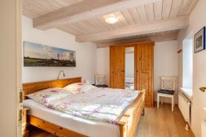 Postel nebo postele na pokoji v ubytování Ferienhaus Blick ins Tüterland