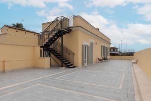 Foto Roomas asuva majutusasutuse JOIVY Cavour Luxury Apartments galeriist +37 fotot