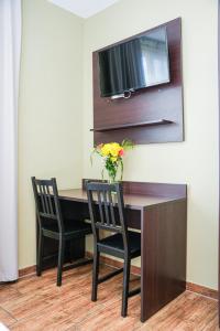 TV a/nebo společenská místnost v ubytování Hotel City Star