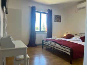 Postel nebo postele na pokoji v ubytování Apartment Šterna in Svetvincenat