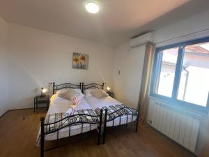Postel nebo postele na pokoji v ubytování Apartment Šterna in Svetvincenat
