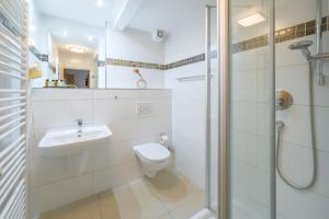 Koupelna v ubytování Hotel Pension Margit