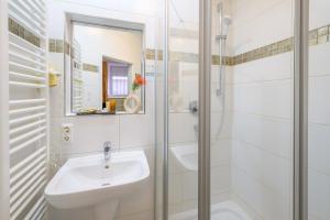 Koupelna v ubytování Hotel Pension Margit