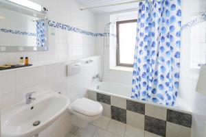 Koupelna v ubytování Hotel Pension Margit