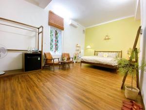 Ein Bett oder Betten in einem Zimmer der Unterkunft Mô Tê Homestay 2 gần Chợ Đông Ba, Cung Đình Hoàng Thành Huế