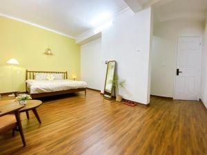 Ein Bett oder Betten in einem Zimmer der Unterkunft Mô Tê Homestay 2 gần Chợ Đông Ba, Cung Đình Hoàng Thành Huế