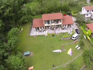 an aerial view of a house with a yard at Villa Oliveto apartments in Oliveto Lario
