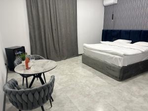Lux Plaza客房内的一张或多张床位