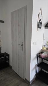 Postel nebo postele na pokoji v ubytování Apartmán - Café Princ pod Hradem WiFi, KLIMA