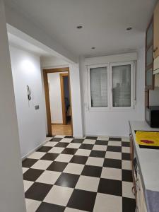 Μια τηλεόραση ή/και κέντρο ψυχαγωγίας στο apartamentos fede 2