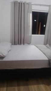 Postel nebo postele na pokoji v ubytování Pousada Beira Mar + 6 fotografií