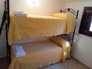 A bed or beds in a room at Casa Eva