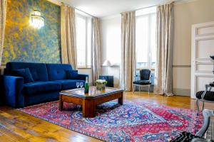 Posezení v ubytování Champagne André Bergère & Suites